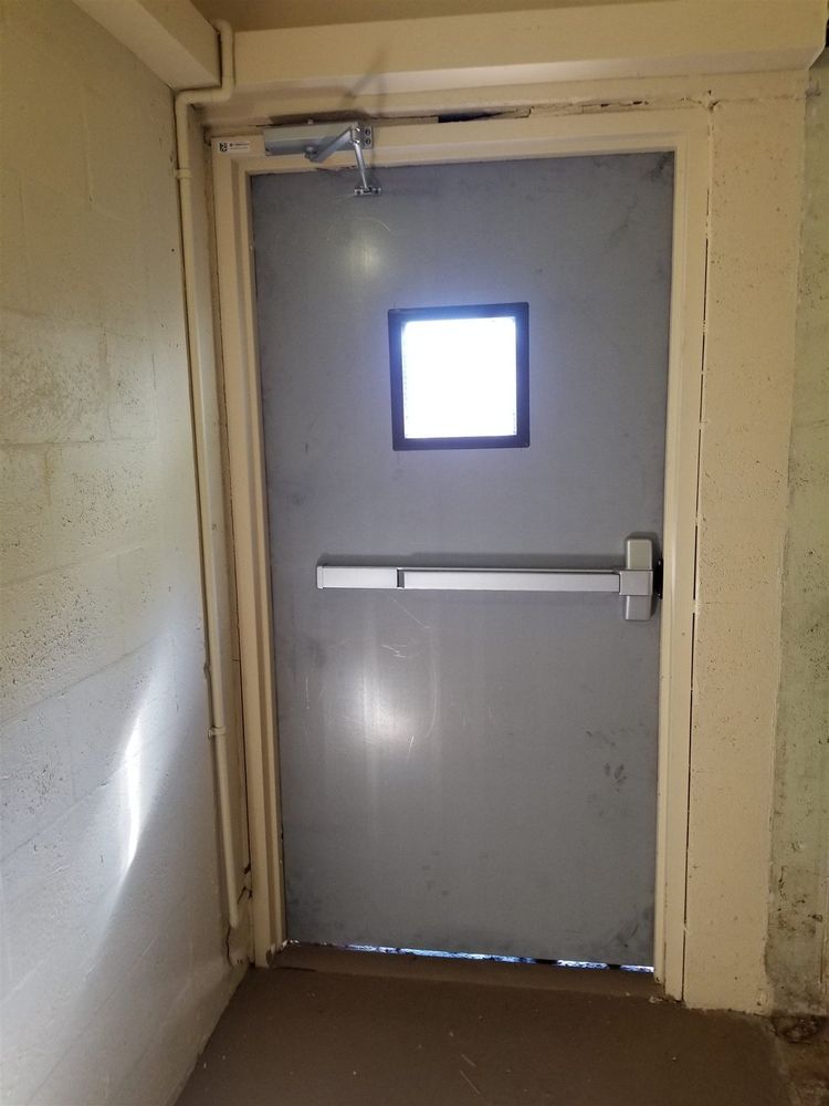 Steel door with square vision lite and panic bar