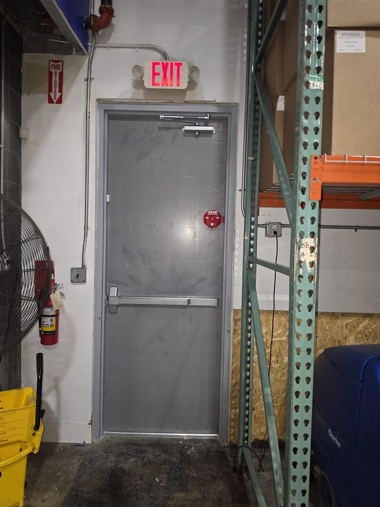 Warehouse emergency exit steel door with panic hardware