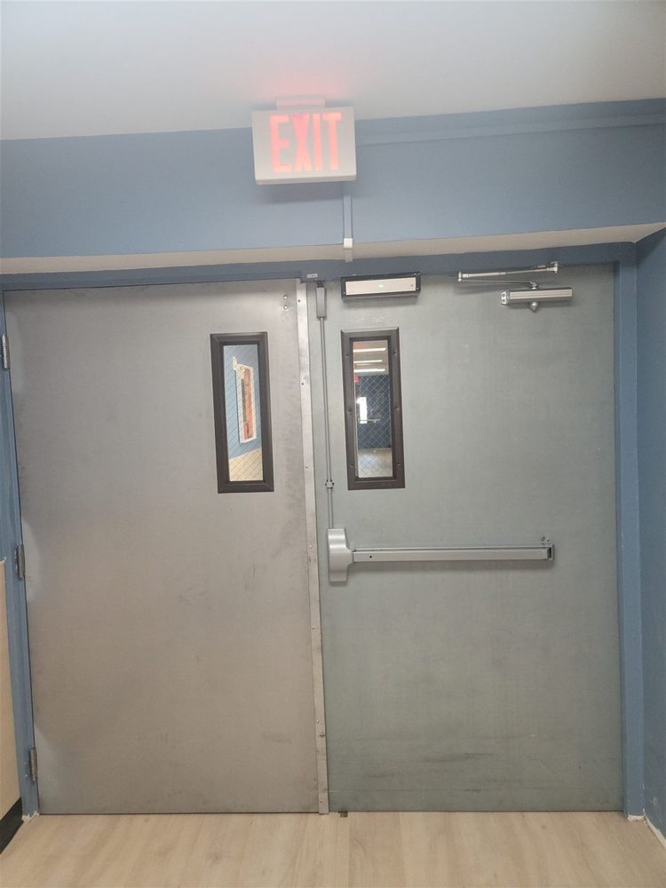 Steel double doors with vision lites and exit device