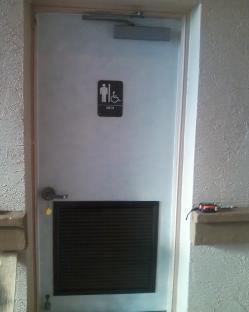 Commercial restroom metal door with replacement louver